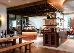 a restaurant with the word boulangerie on the ceiling