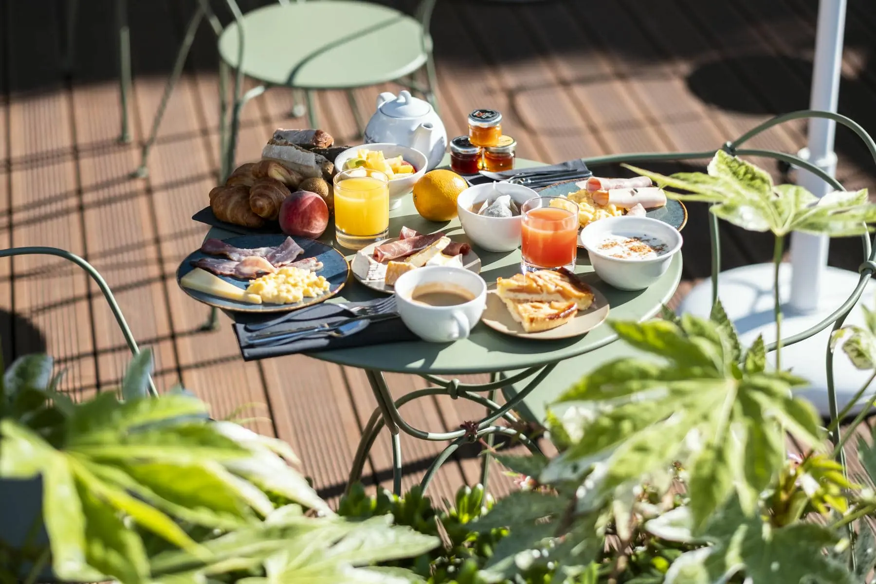 a table with a variety of food and drinks on it