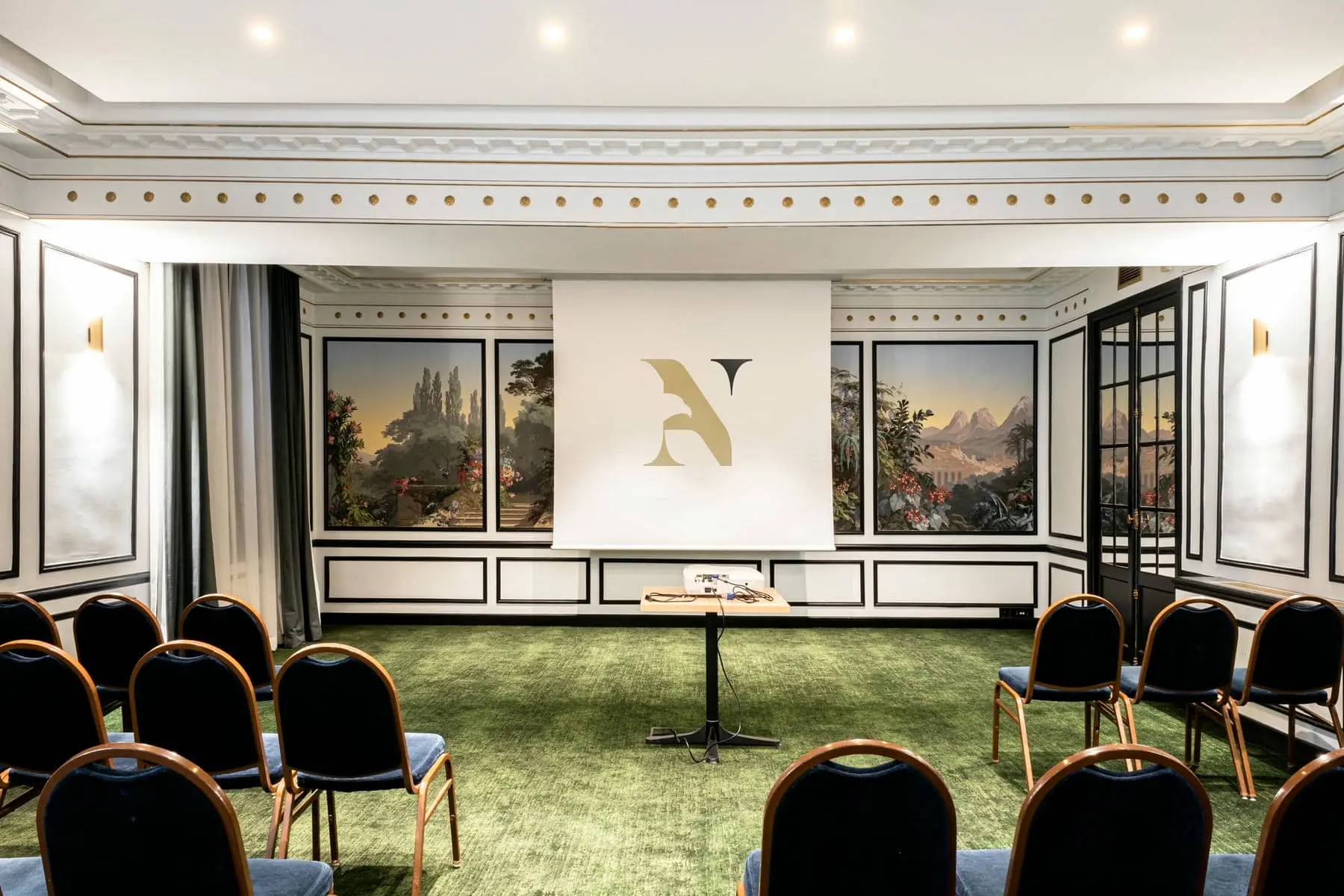 a projector screen with the letter a on it