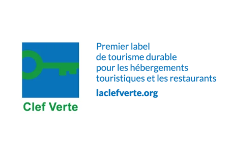 a blue and green logo for Clef Verte, first ecotourism label