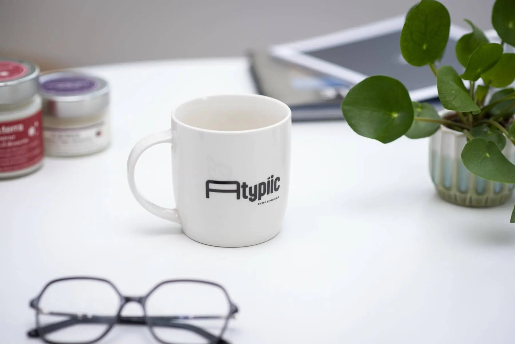 a white mug with the word typic on it