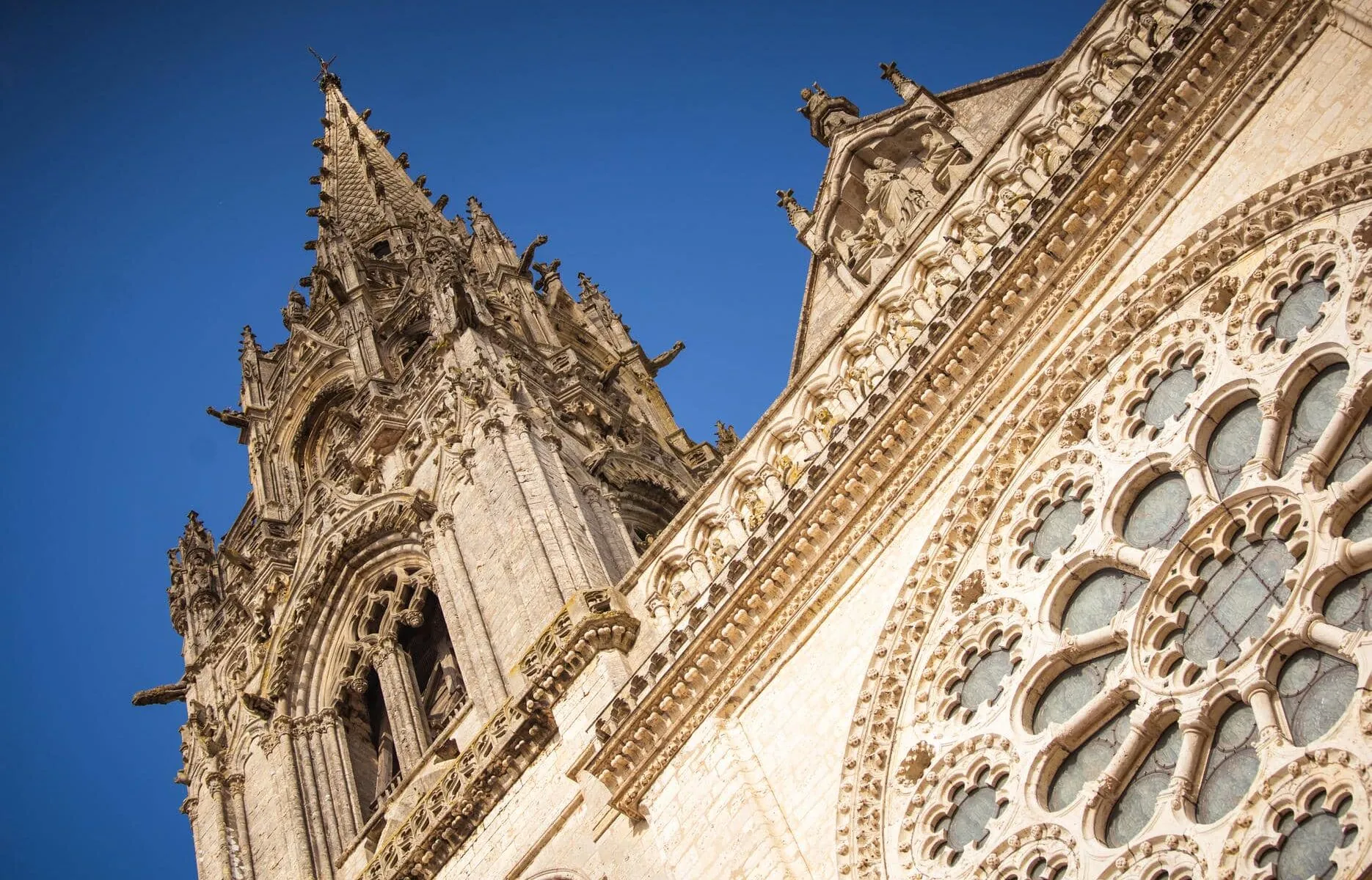 a very ornate building with a blue sky in the background