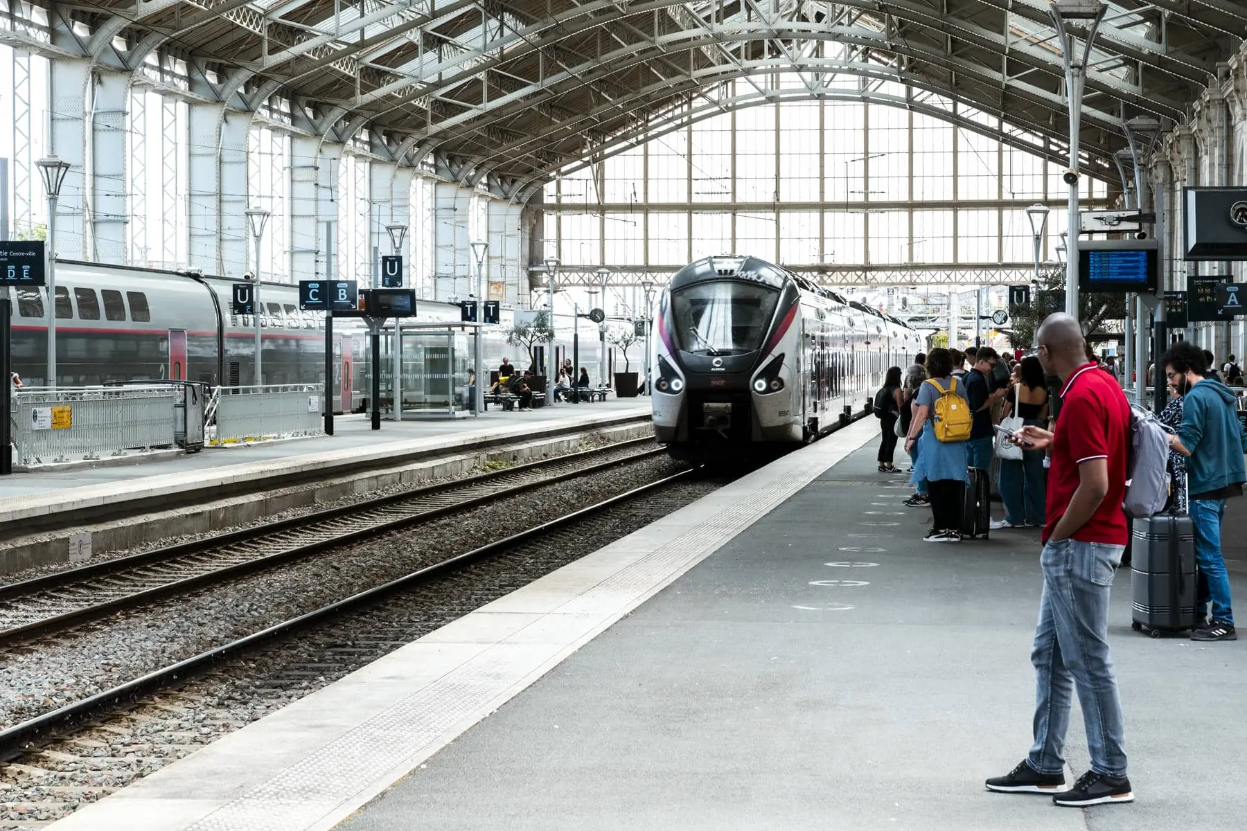 a train station with a sign that says u on it