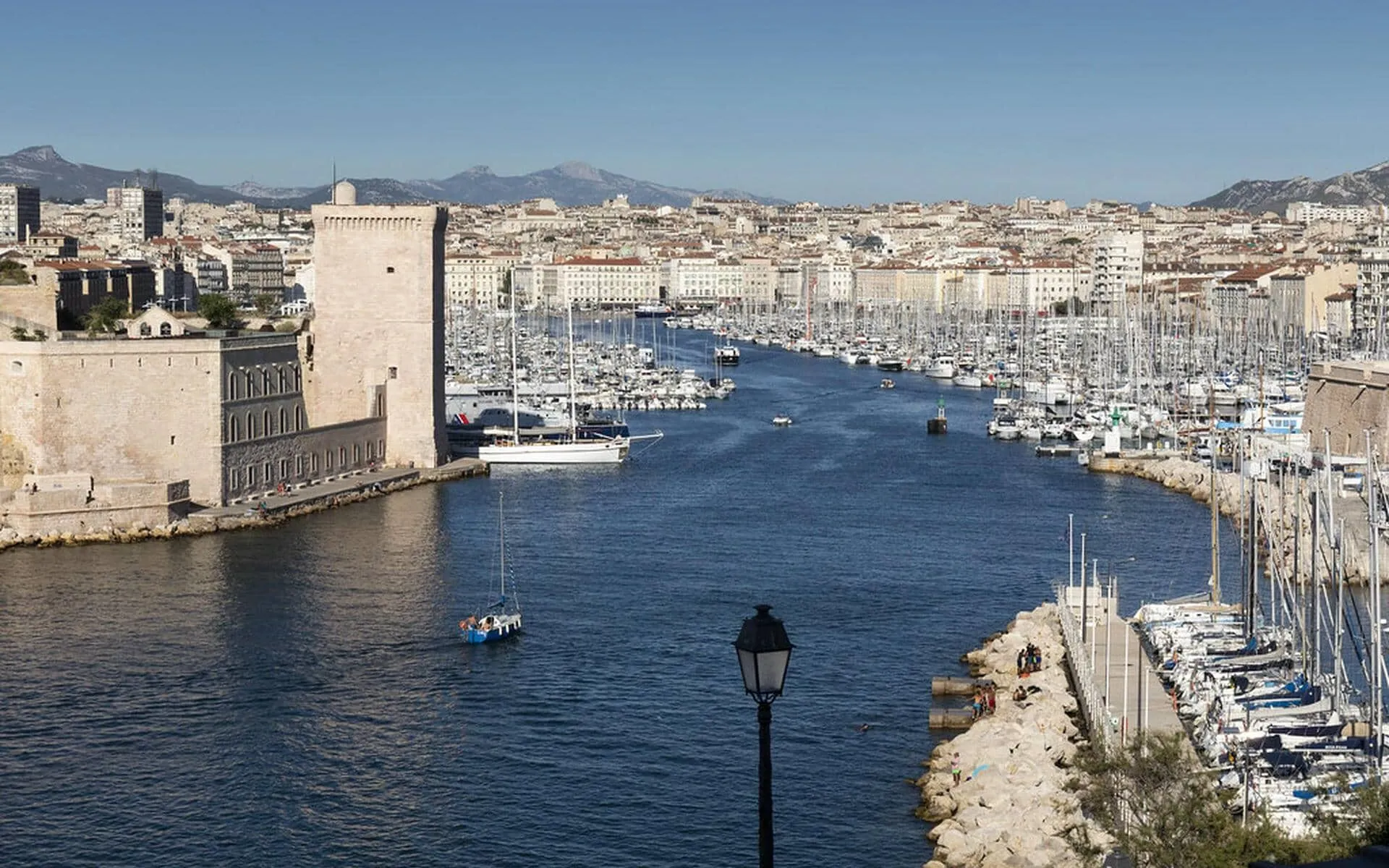 a large body of water with many boats in it
