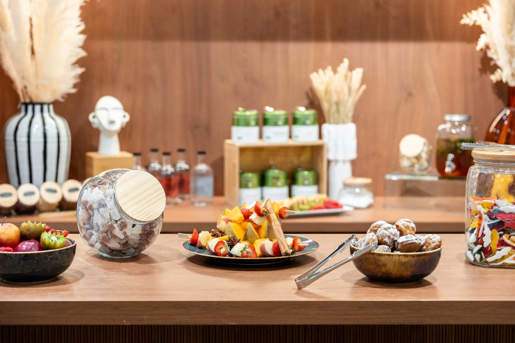 a seminar coffee break setup with a variety of food and drinks in a coffee corner